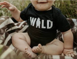 WILD onesie
